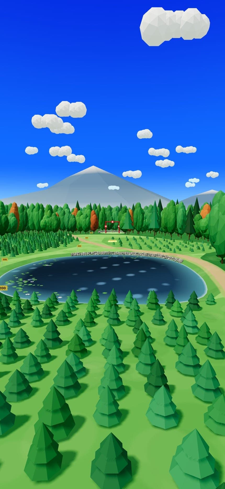 A disc golf hole in Disktance: a pond, a mountain and a fairway through the pines